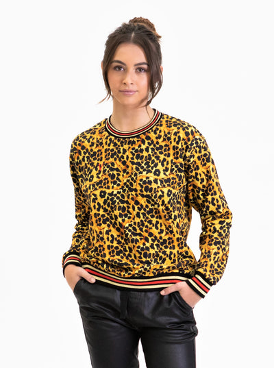 Leopard Craze sweater by St VIVID. A leopard print, 100% Organic Cotton terry knit women's sweater, with a black, soft metallic gold and red striped trim.